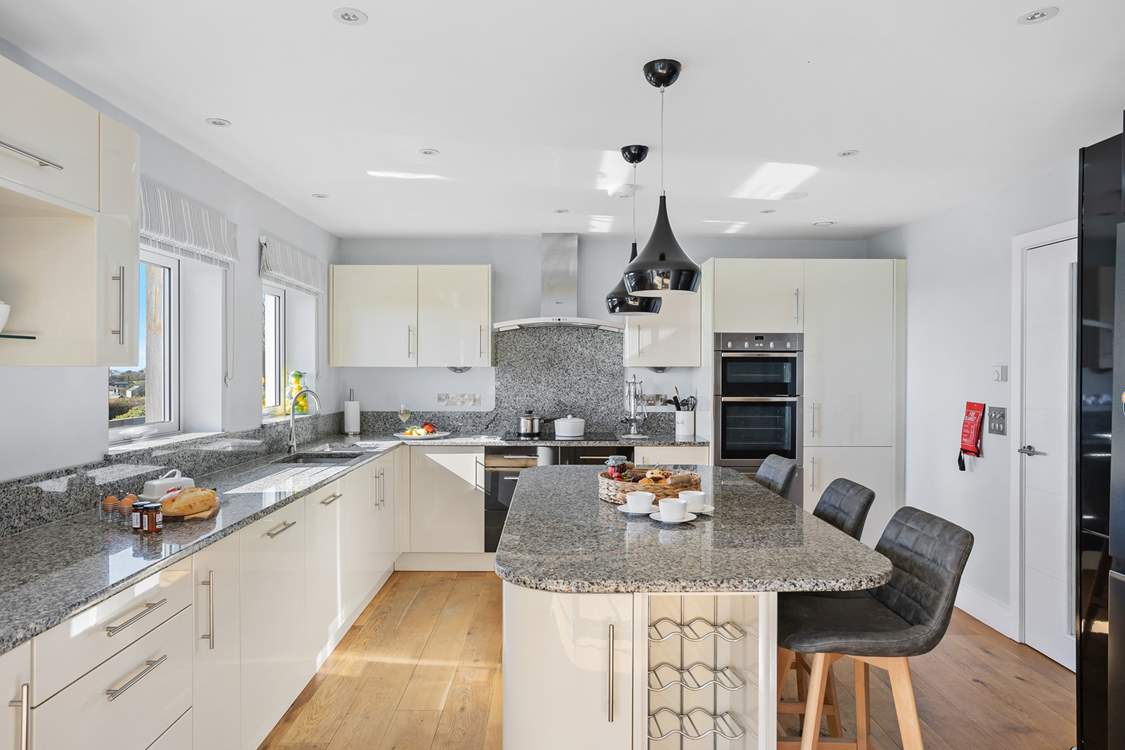 Take a pew whilst the chef serves up a holiday feast in the well-equipped kitchen.