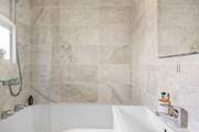 The en suite bathroom to bedroom 1.