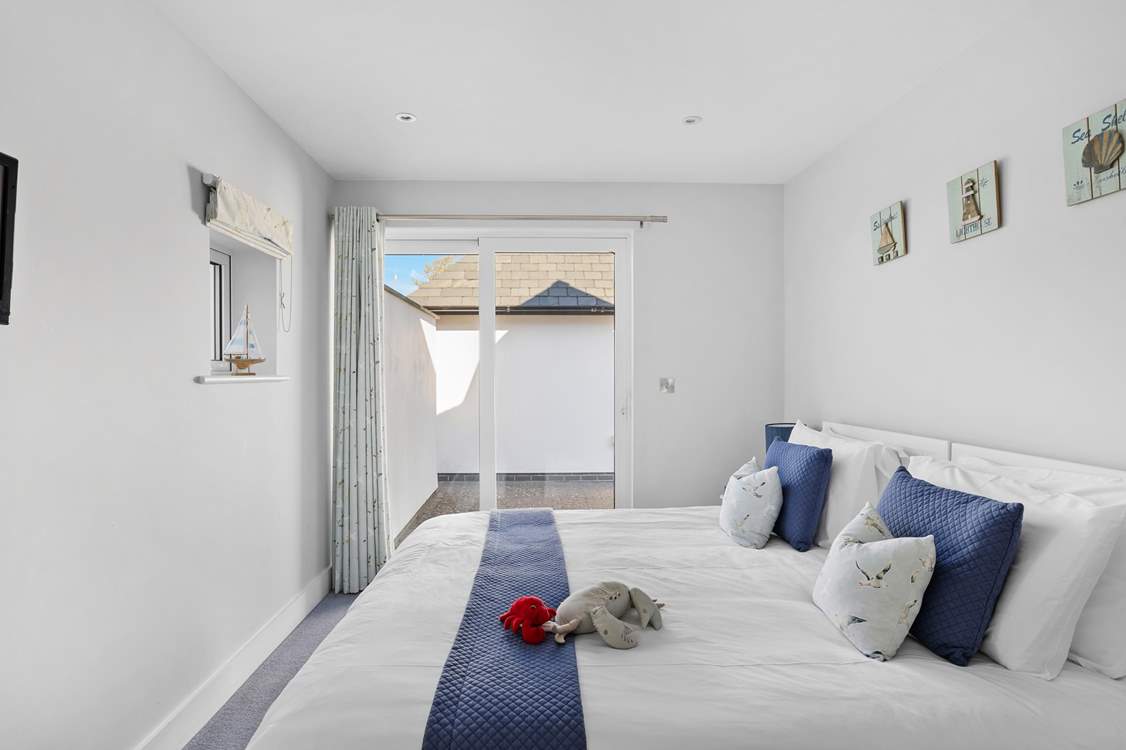 Bedroom 3 also has patio doors to the outside and can be made up as a super-king or a twin bed - the choice is yours!