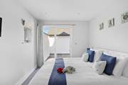 Bedroom 3 also has patio doors to the outside and can be made up as a super-king or a twin bed - the choice is yours!