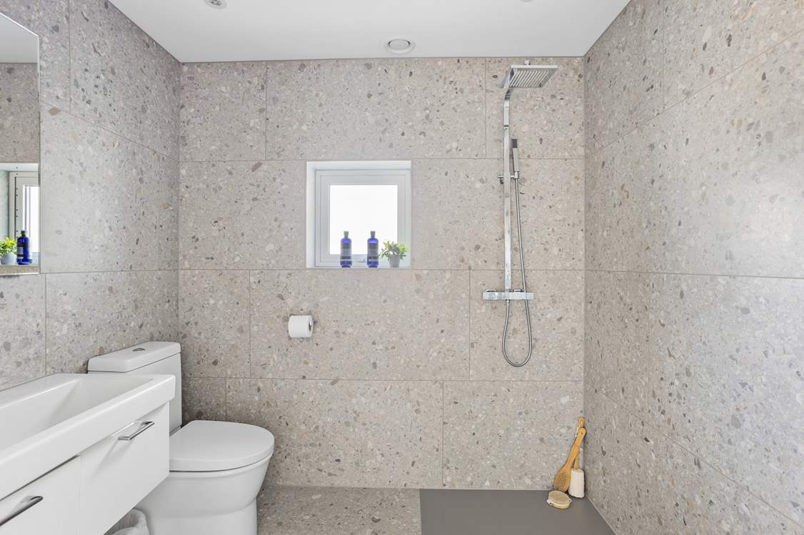 There is also a handy wet-room on the ground floor to wash away those sandy toes.