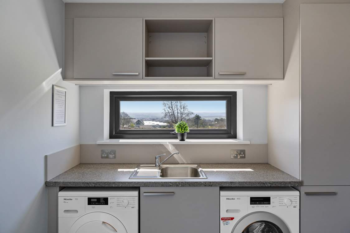 There's even a handy utility-room for keeping on top of the washing.