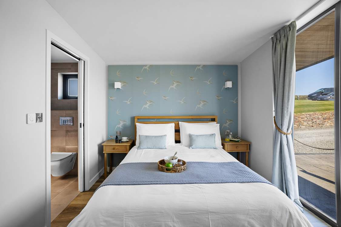 Bedroom 1 has a comfy king-size bed and en suite bathroom.