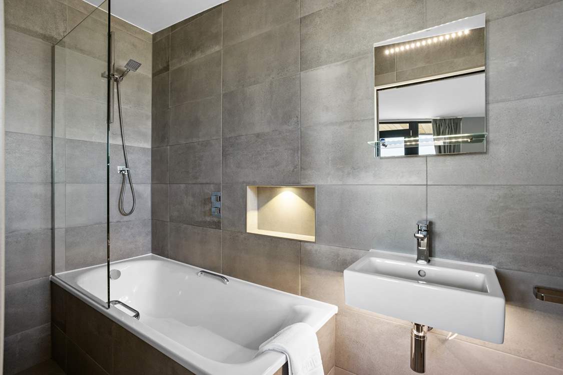 Relax in the bath after a day of adventures or enjoy a refreshing morning shower.