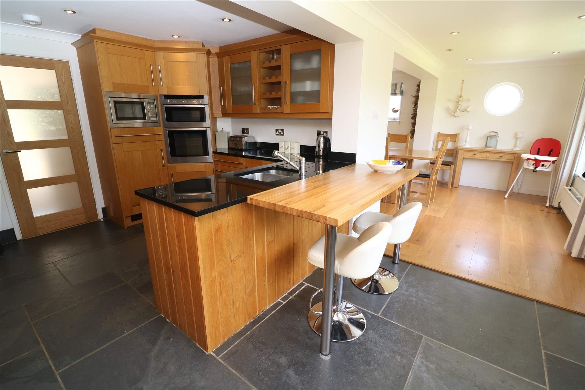 Perch at the breakfast-bar and chat with the chef. 