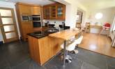 Perch at the breakfast-bar and chat with the chef.  - Thumbnail Image