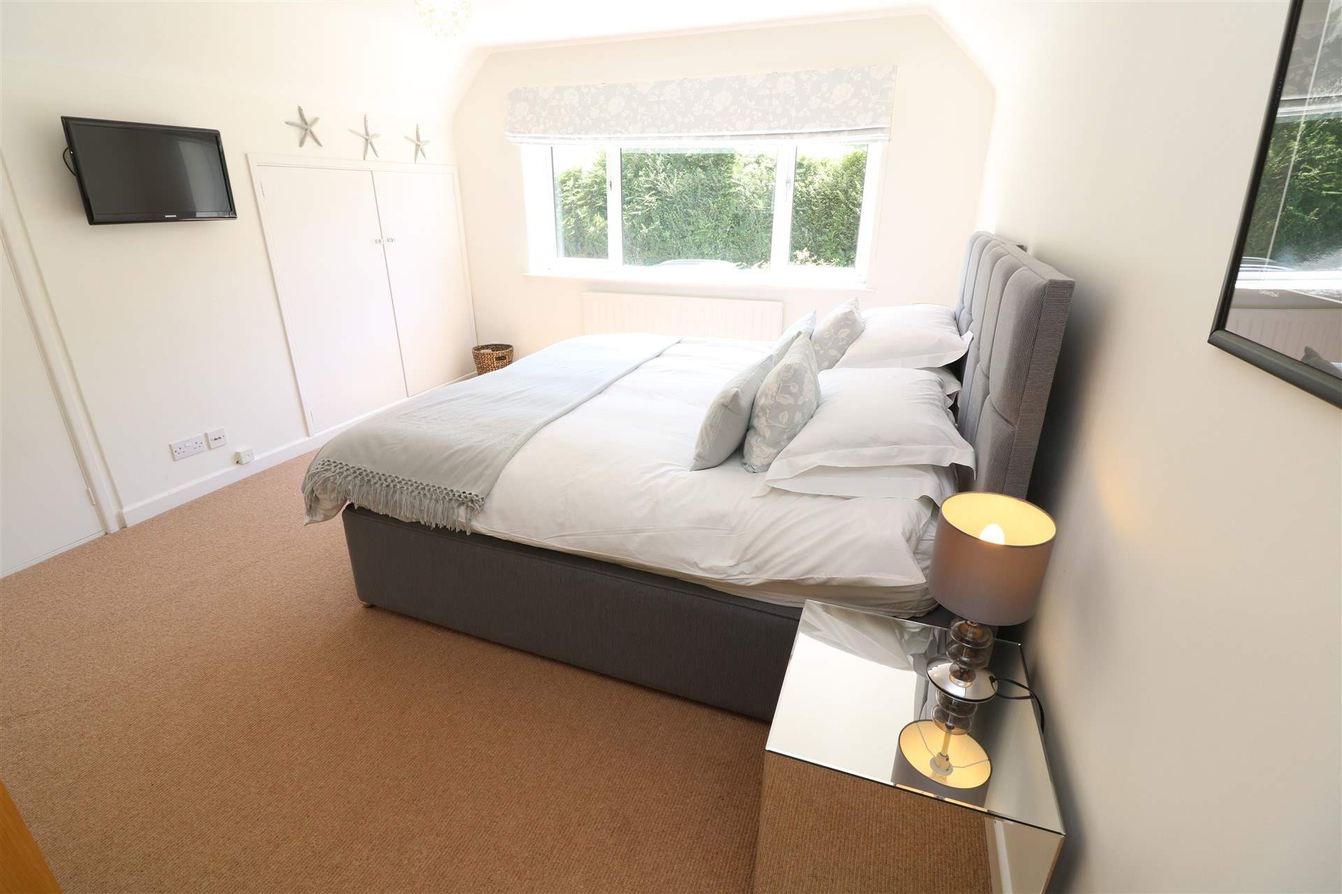 Each room has lovely bed linens. 