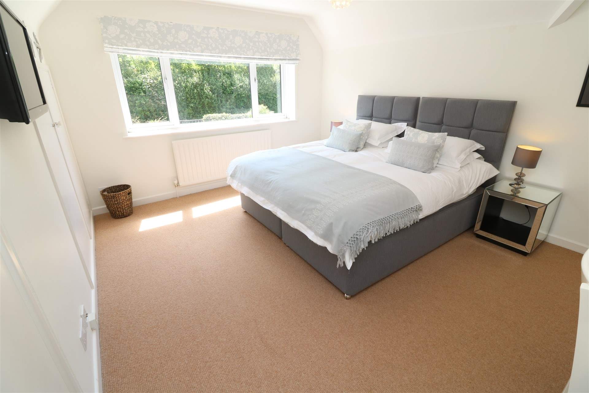 Three bedrooms are located on the first floor. 