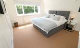 Three bedrooms are located on the first floor.  - Thumbnail Image
