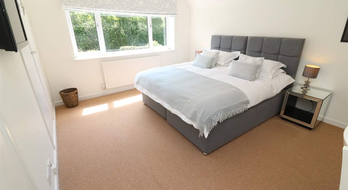 Three bedrooms are located on the first floor. 