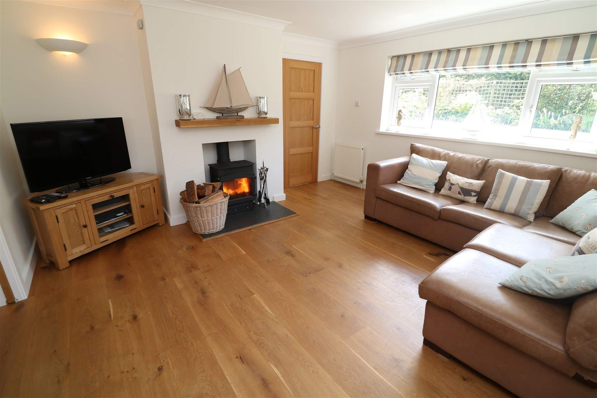 Relax in the sitting-room and light the wood-burner at cooler times of the year. 