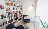 Choose your reading material and enjoy this charming spot.  - Thumbnail Image