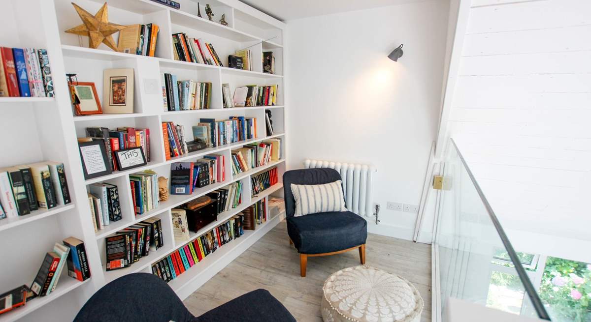 Choose your reading material and enjoy this charming spot. 
