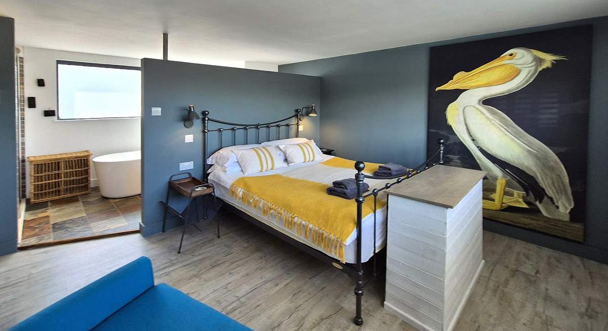 The gorgeous bathroom with free-standing bath sits behind the screen in bedroom 4 on the first floor. 