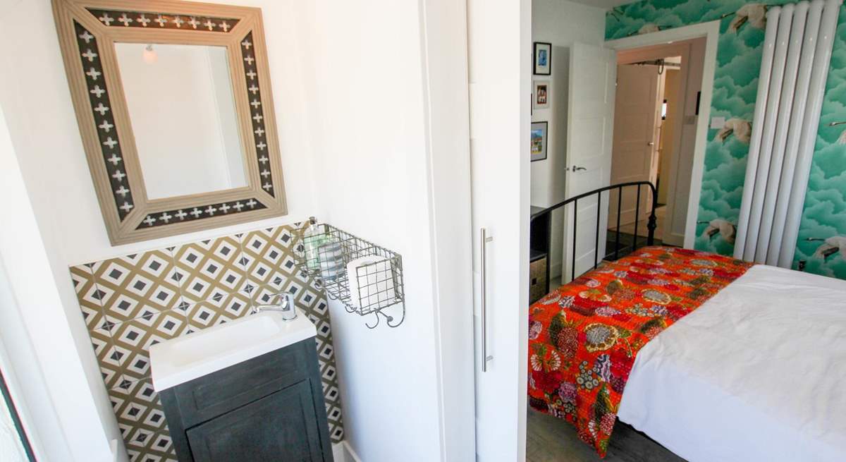 This bedroom has a cloakroom too. 