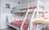 The perfect bright bunk bed room with a double bed on the bottom and a single on top. - Thumbnail Image