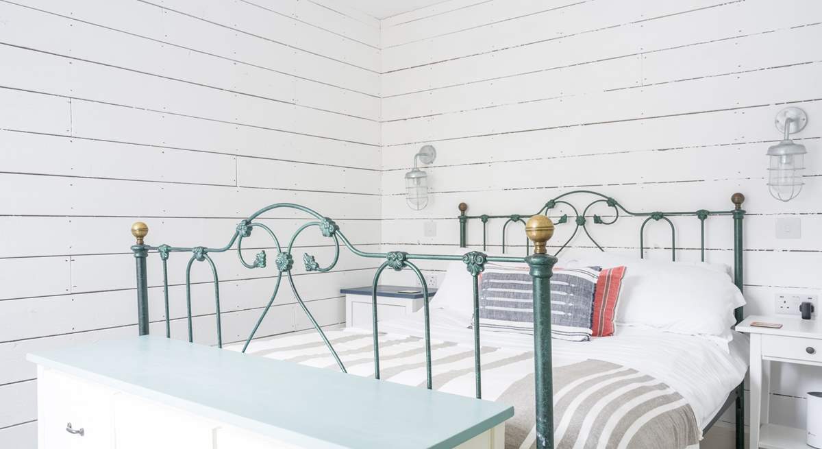 A room that feels like a true beach hut retreat.