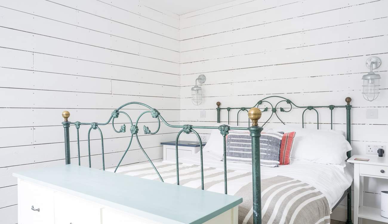 A room that feels like a true beach hut retreat.