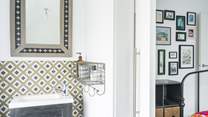 The cloakroom sits behind an envelope door.