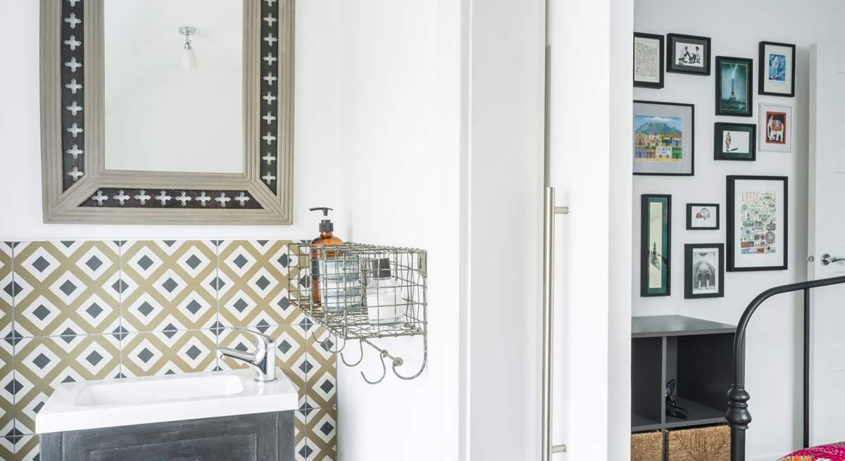 This washroom sits behind an envelop door.