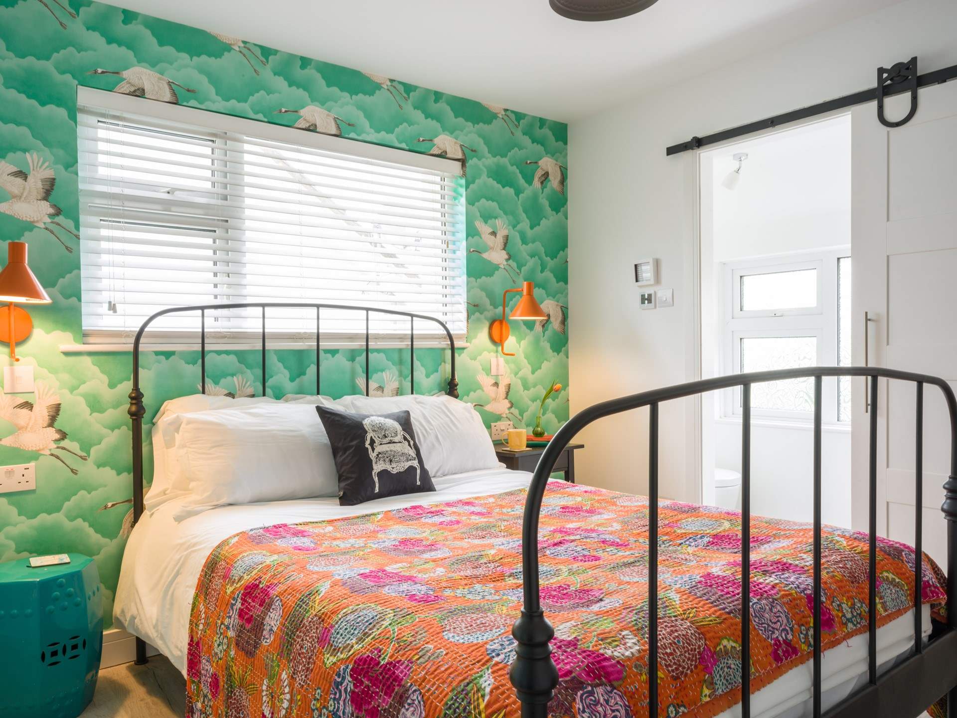 A delight on the eye and a true holiday room with a WC and sink room.