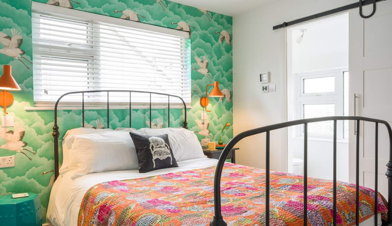 A delight on the eye and a true holiday room with an en suite cloakroom.