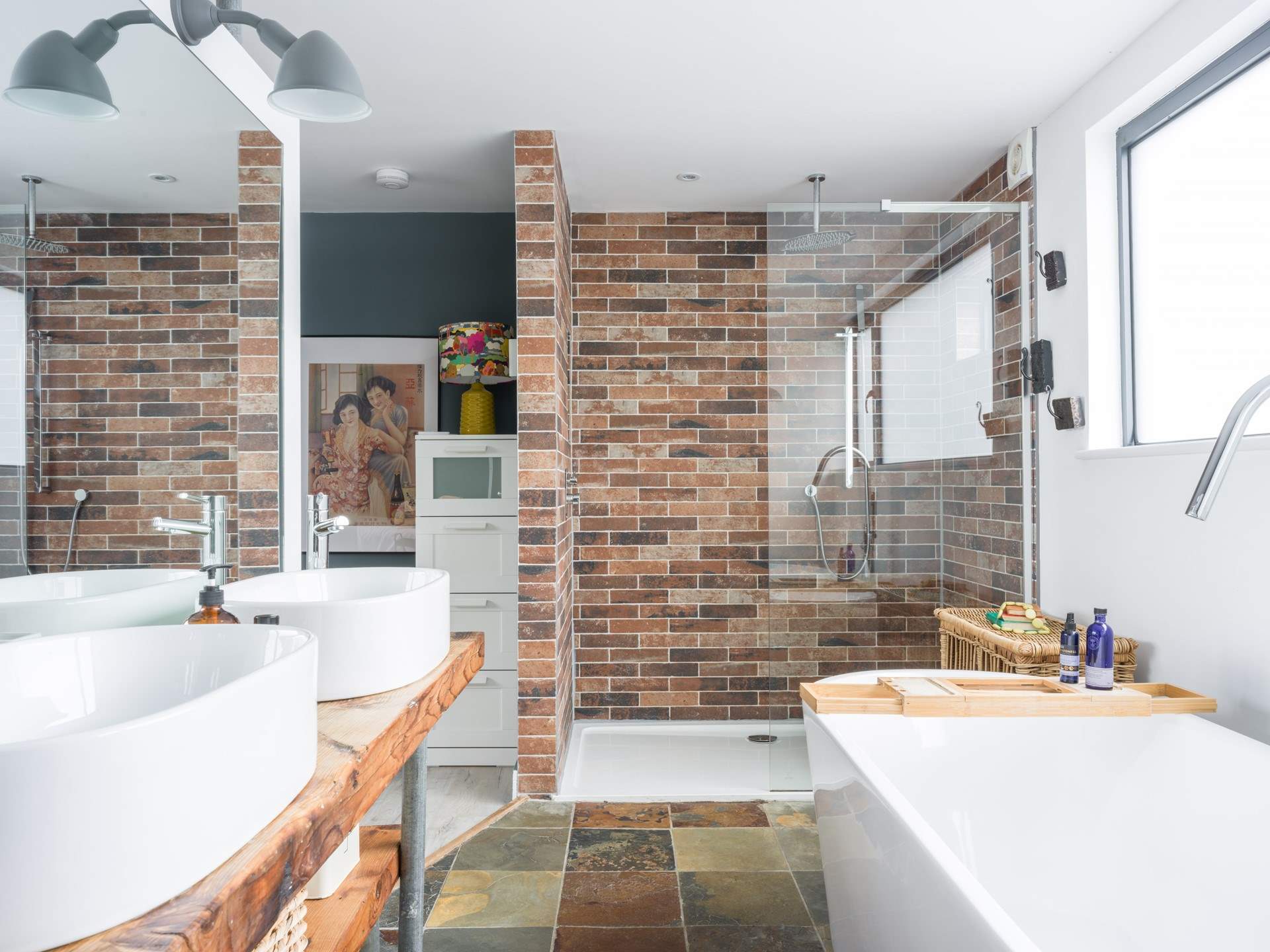 This en suite bathroom is both gorgeous and spacious the WC is in a separate room for privacy. 