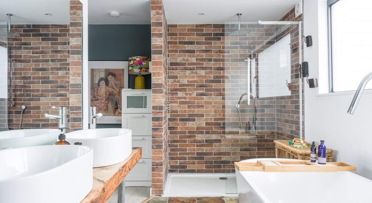This en suite bathroom is both gorgeous and spacious the WC is in a separate room for privacy. 