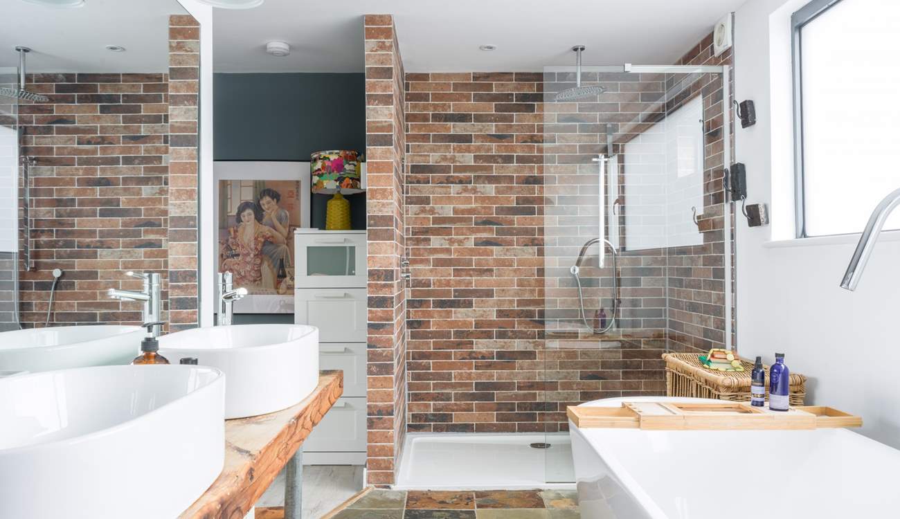 This en suite bathroom is both gorgeous and spacious. The WC is in a separate room for privacy. 