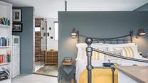 Hidden behind the wall you will discover the en suite.