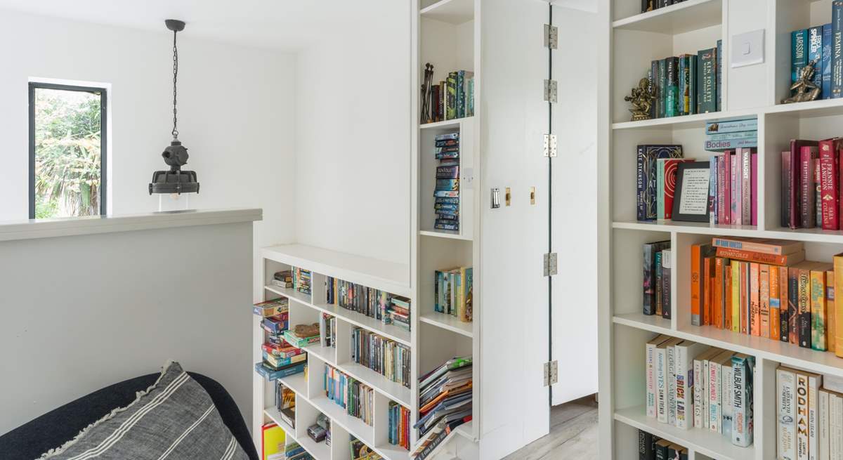 Push open the secret door and head on in to the first floor bedroom.