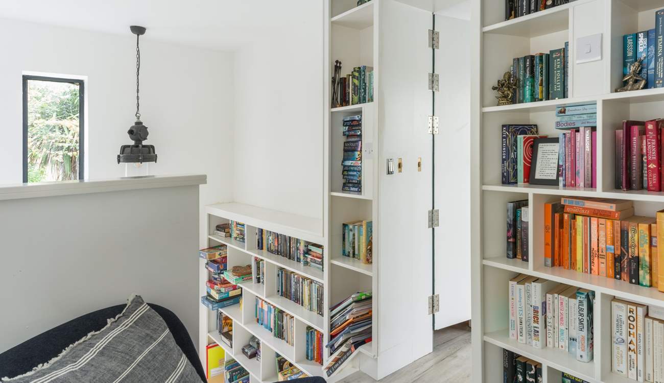 Push open the secret door and head on in to the first floor bedroom.