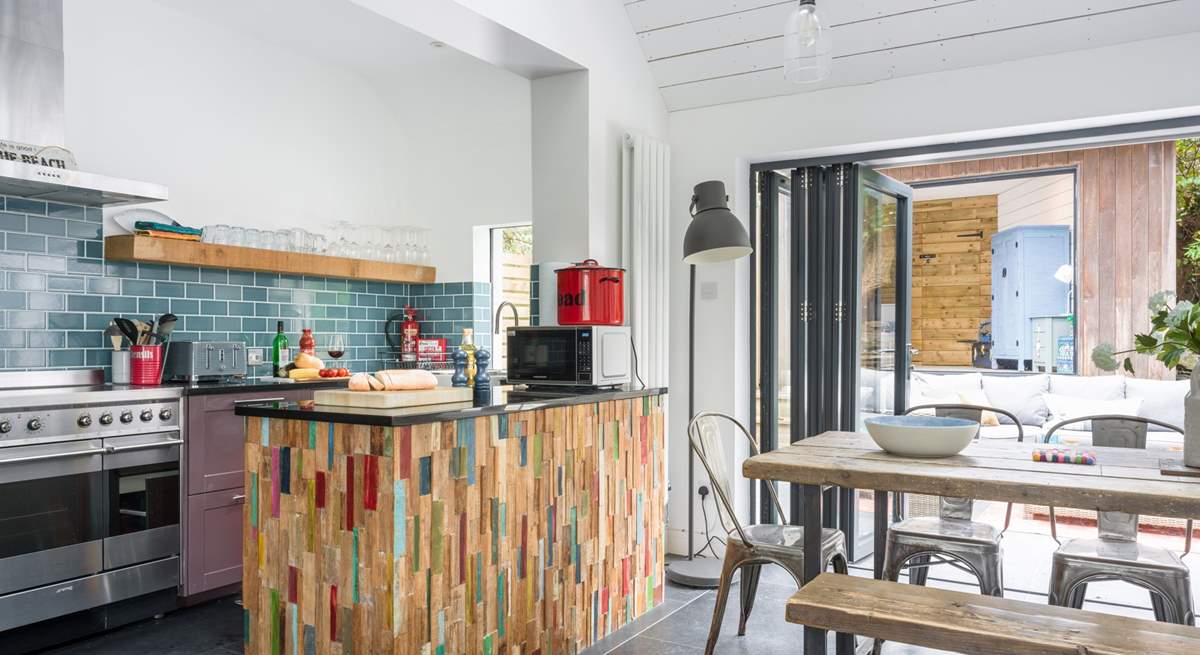 The kitchen is styled and equipped for your enjoyment.