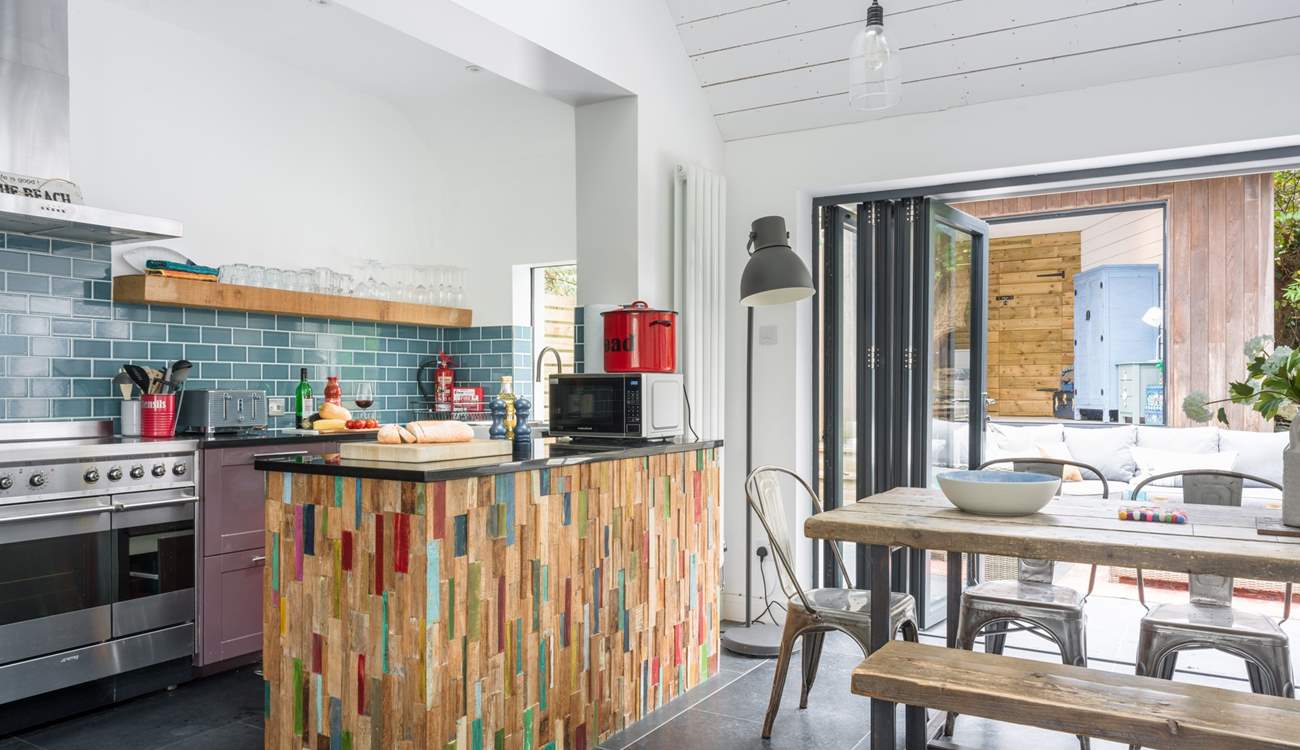 The kitchen is styled and equipped for your enjoyment.