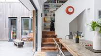 Pass the little reading nook and head upstairs to discover the secret library door. 
