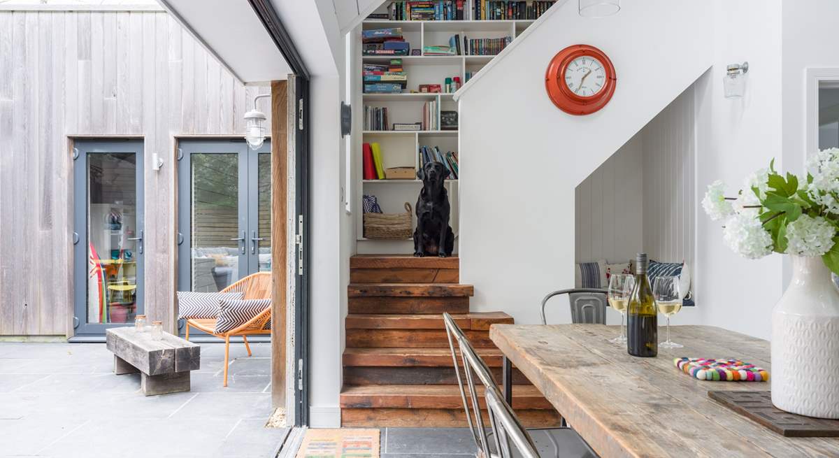 Pass the little reading nook and head upstairs to discover the secret library door. 