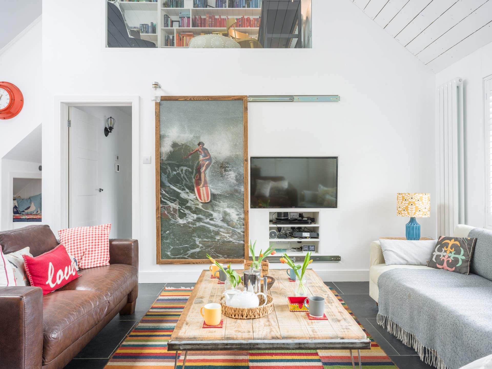 Slid the picture back when it's time for the family film night.