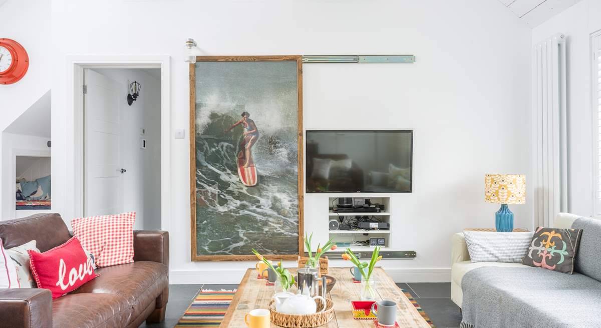 Slid the picture back when it's time for the family film night.