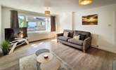 The sitting-room is light and bright.  - Thumbnail Image
