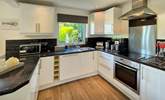 The well-equipped kitchen has everything you'll need. - Thumbnail Image