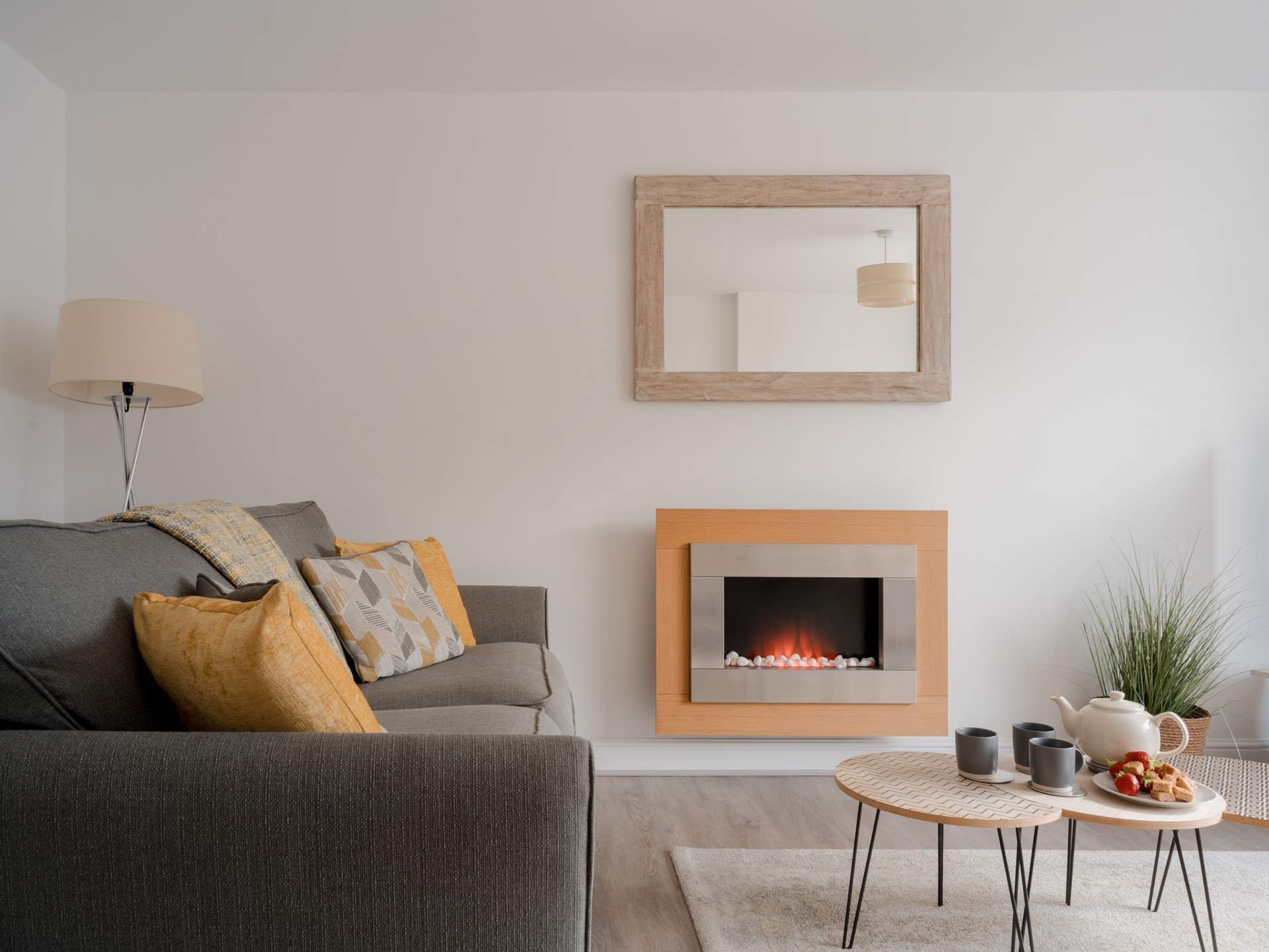 The sitting-room has a pebble-effect electric fire for cosy evenings.