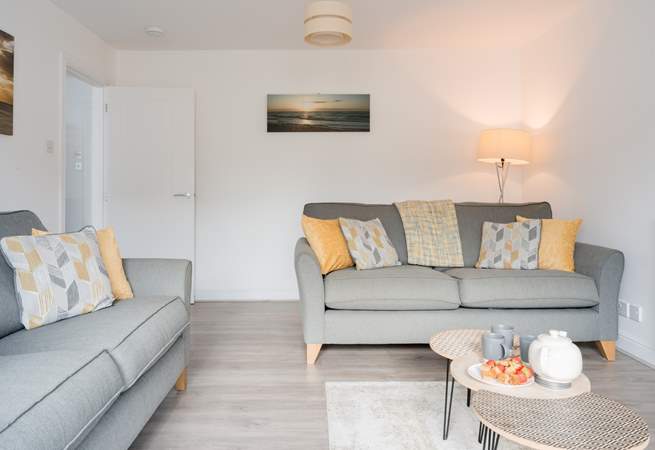 Relax into one of the comfy sofas after a day on the beach.