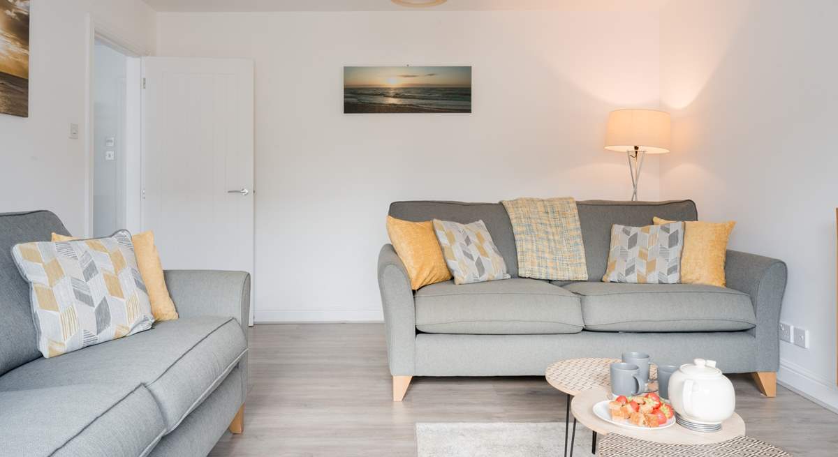 Relax into one of the comfy sofas after a day on the beach.