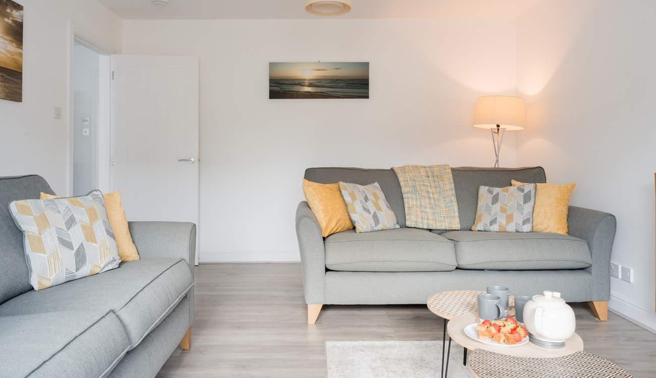 Relax into one of the comfy sofas after a day on the beach.