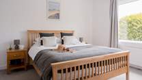 The bedrooms are perfect for a restful night. 