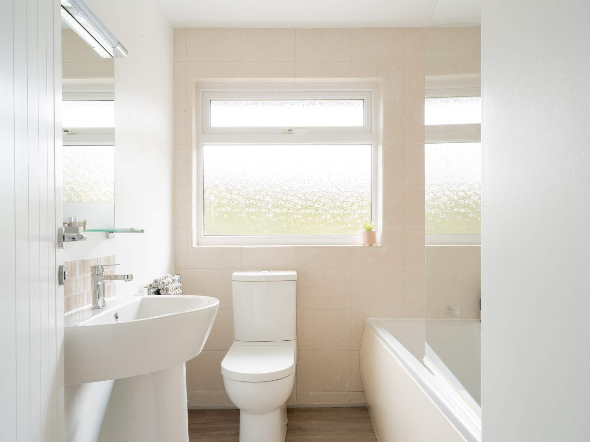 Rinse off those sandy toes in the family bathroom.