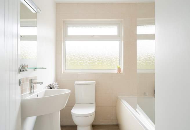 Rinse off those sandy toes in the family bathroom.