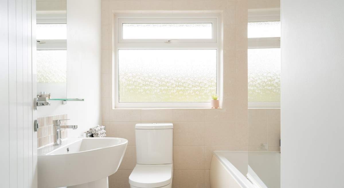 Rinse off those sandy toes in the family bathroom.