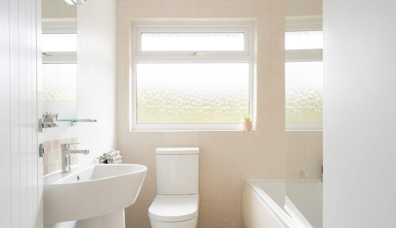 Rinse off those sandy toes in the family bathroom.