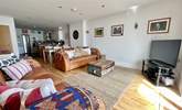 After a busy day, snuggle up on the sofas and watch a movie. - Thumbnail Image